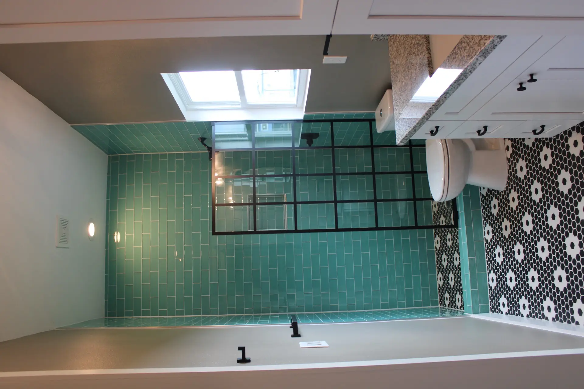 Covered rear deck off the master bedroom with ceiling fan, white railing, and views of Tiki Island palm trees and landscaping