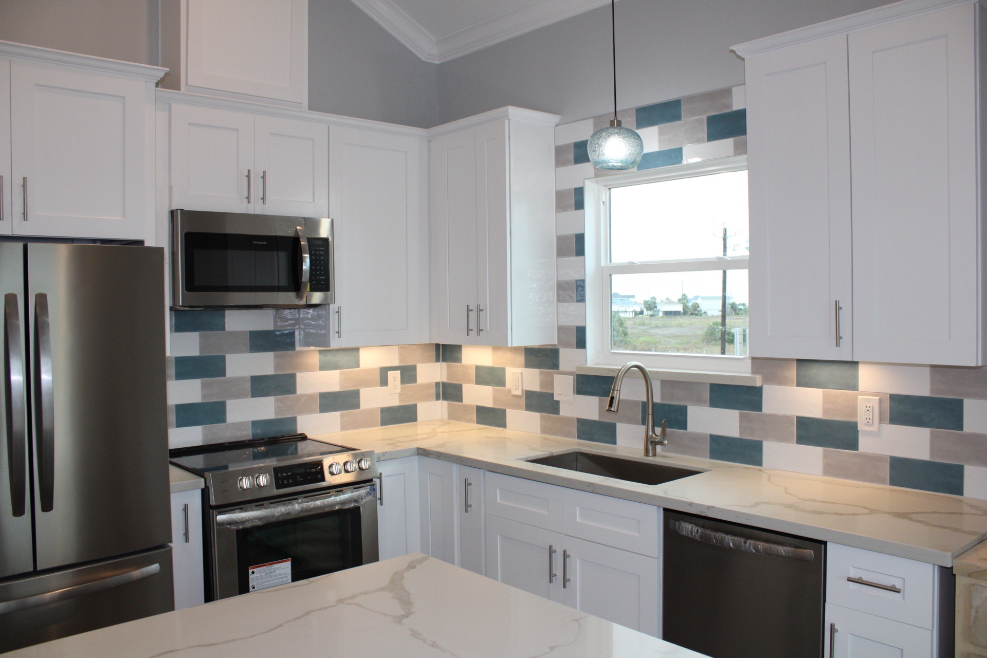 Bunk loft detail showing the ladder access to the upper sleeping area with built-in railing and cozy reading nook above