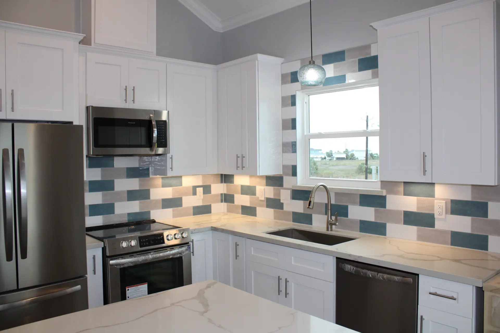 Bunk loft detail showing the ladder access to the upper sleeping area with built-in railing and cozy reading nook above