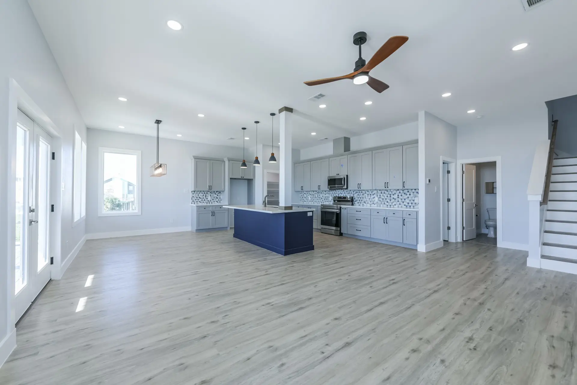 Chef's kitchen with designer backsplash and premium finishes at 4003 Pirates Beach