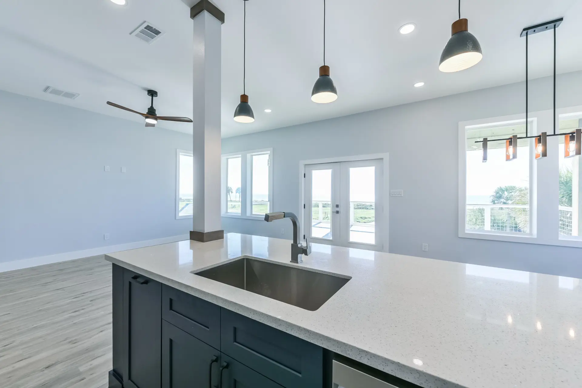 View from living area toward kitchen showing seamless open-concept layout at 4003 Pirates Beach