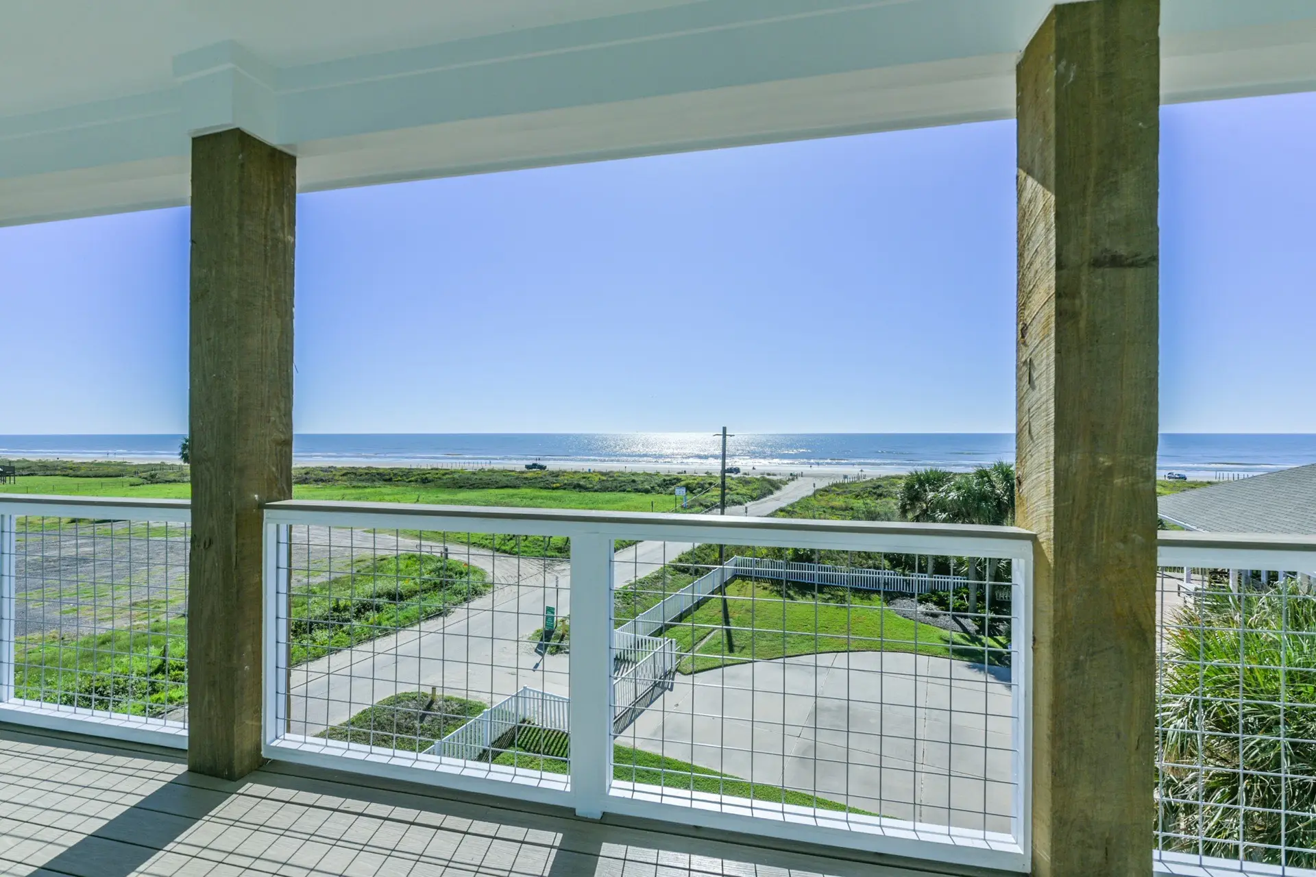 Spacious upper deck with ceiling fan and Gulf views at 4003 Pirates Beach custom home