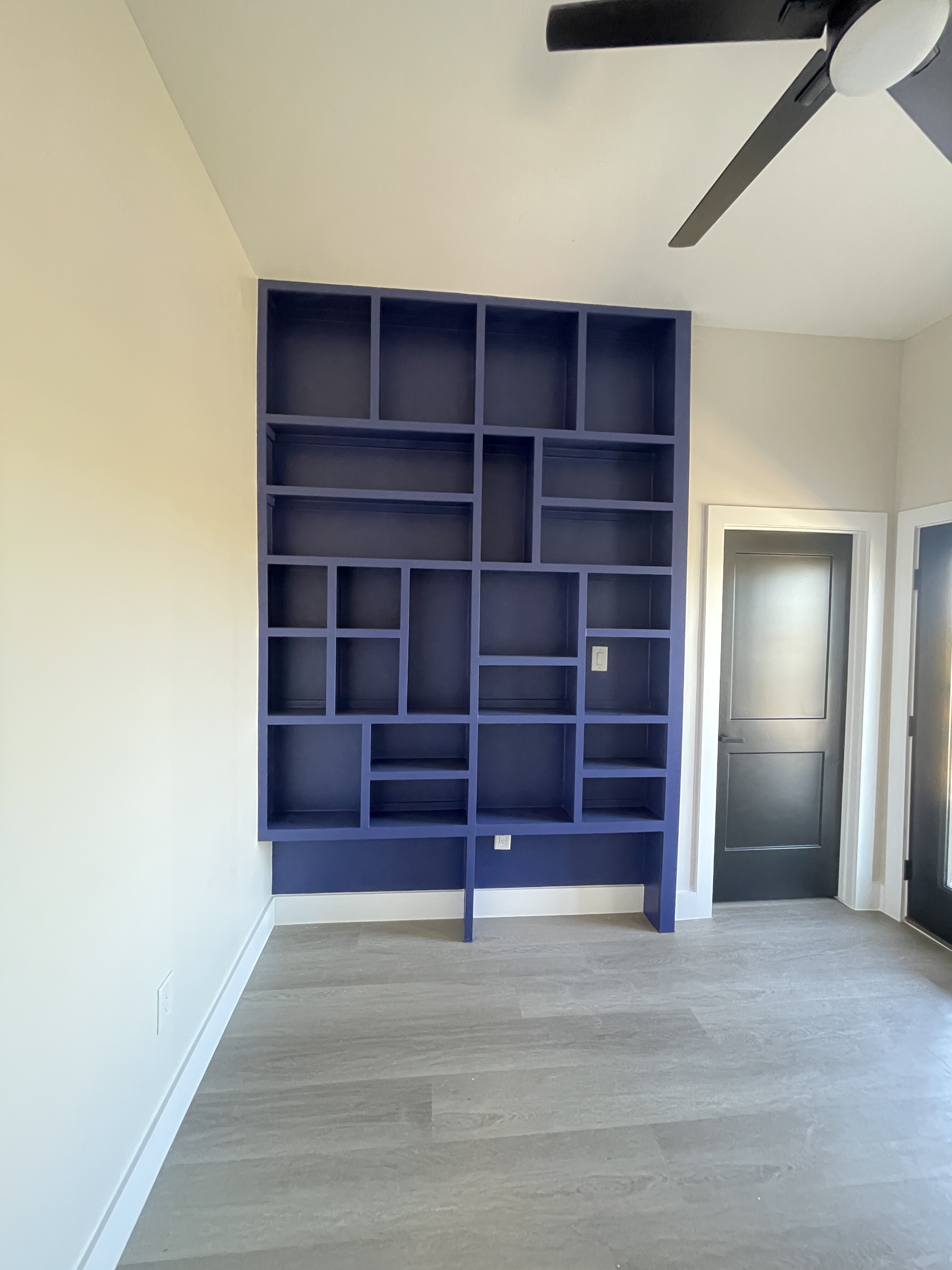 Den with built-in bookshelf