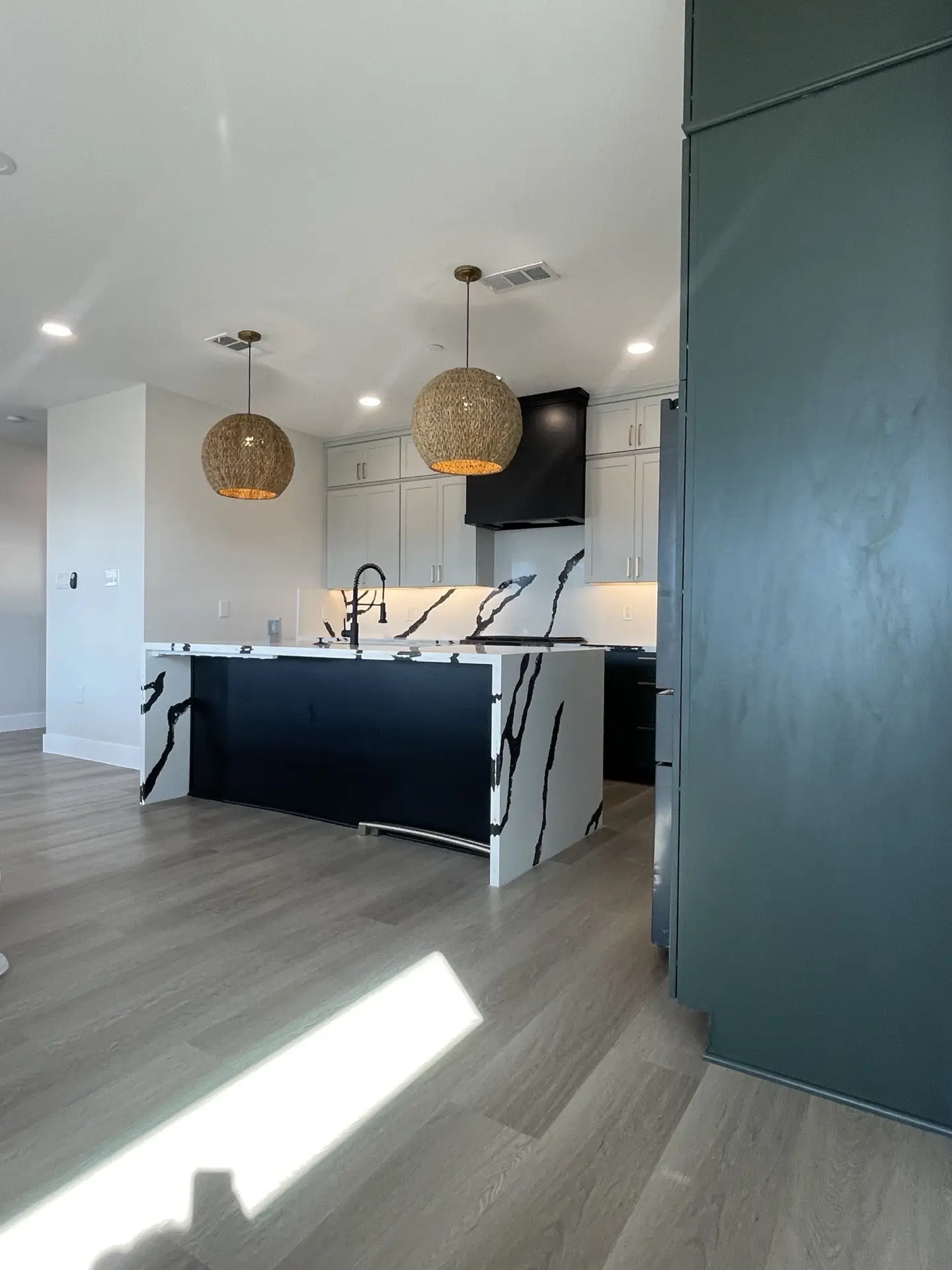 Fifth bathroom with unique custom tile selection, contemporary vanity design, and curated designer hardware throughout