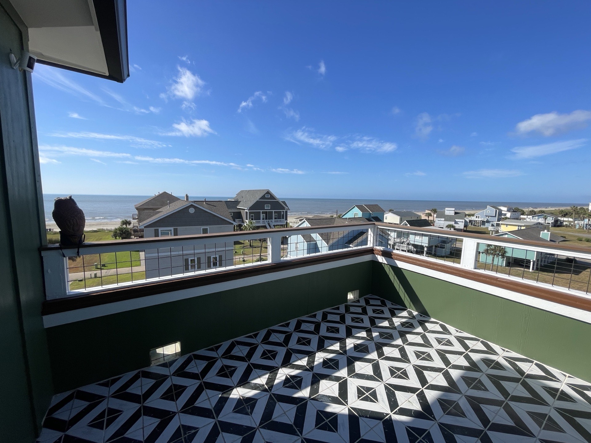 Interior elevator cab with polished finishes and modern panel design providing access to all levels of the luxury Galveston home